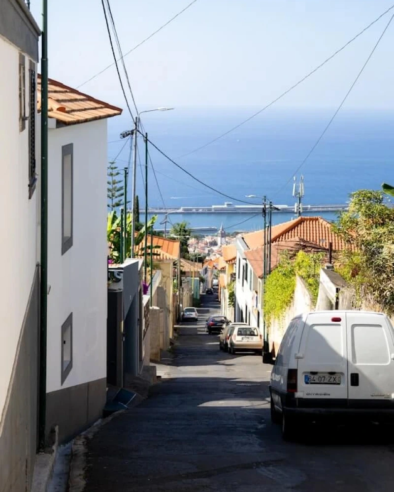 narrow steep street in Funchal Madeira car rental risk - madeira car rental guide